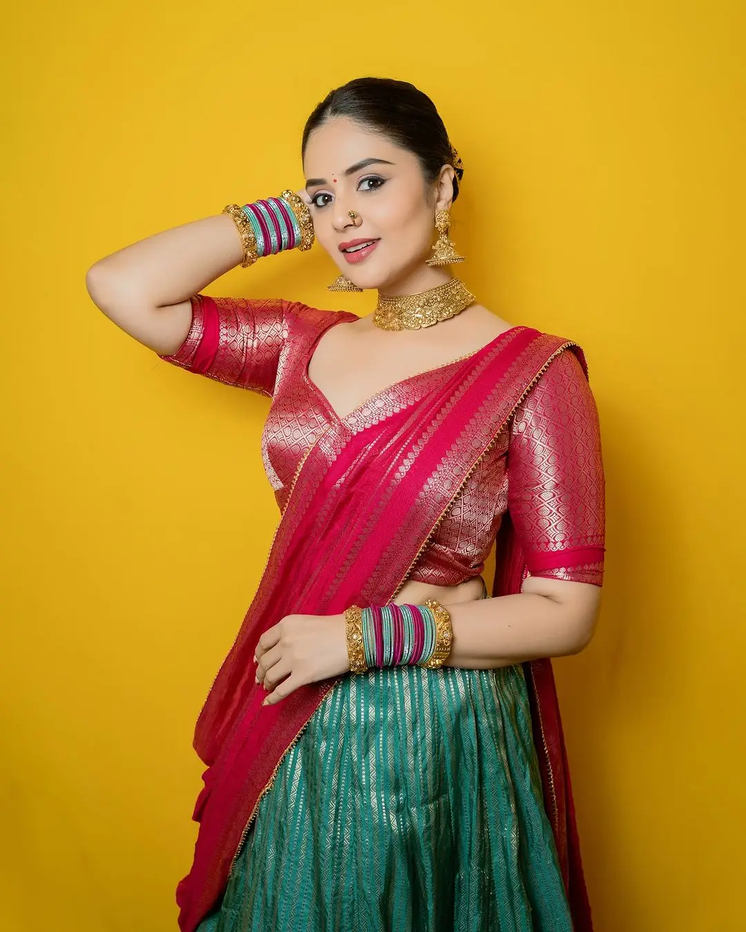 Telugu Actress Sreemukhi Stills In Green Lehenga Choli